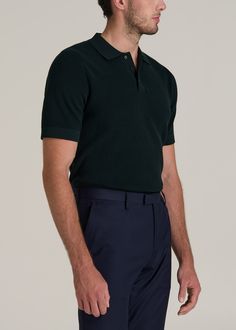 Purl Knit Polo for the Tall Man with Style Refined Relaxation Elevate your casual look with our Purl Knit Tall Men's Polo Shirt. This isn't just an extra-long polo shirt—it's a statement of sophistication made with the taller guy in mind. The modern fit and longer-than-hip length ensure a sleek silhouette without sacrificing comfort. Whether it’s for a smart-casual meeting or a weekend getaway, this men's tall polo shirt, with its ribbed hem and cuffs, ensures you stand out in the best way possi Casual Wool Ribbed Polo Sweater, Casual Ribbed Wool Polo Sweater, Green Wool Casual Tops, Casual Green Wool Tops, Classic Wool Knitted Tops, Classic Green Textured Knit Sweater, Casual Merino Wool Polo Sweater, Casual Knitted Polo Sweater For Work, Casual Merino Wool Polo Sweater For Business Casual