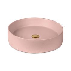 a round pink bathroom sink on a white background