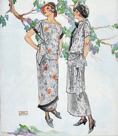 two women standing next to each other in front of a tree with leaves on it