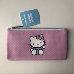 This Sanrio Hello Kitty Pencil Pouch Is A Must-Have For Any Hello Kitty Fan! The Pink Plastic Pouch Features A Zipper Closure And Measures 8.75in Length And 4.25in Width. It Can Be Used As A Pen Case Or Handbag To Store All Your Essential Items. The Pouch Is Brand New And Has Never Been Used. The Hello Kitty Character Is A Popular Franchise That Has Been Featured In Tv Shows, Films, And Anime. This Pencil Pouch Is An Officially Licensed Sanrio Product And Was Manufactured In China. The Pouch Is Cute Pink Stationery For Everyday Use, Cute Pink Stationery With Zipper Pouch, Cute Pouch Bag With Pen Slots, Hello Kitty Pencil, Stationary Box, Pencil Case Pouch, Fotos Aesthetic, Hello Kitty Characters, Plastic Pouch