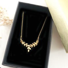 "Gold Branch Necklace | Delicate Branch Pendant | Minimalist leaf Necklace | Nature Necklace | cute pendant | dainty jewelry | gift for women ♡ DESCRIPTION Delicate elegant necklace with leaf pendant, made of sterling gold plated 24 k over sterling silver 925. ♡ DETAILS Charm :0.78\"- 20 mm Chain length : approx. shorter 16.53\" or longer 18.11\" ( 42 or 46 cm) Material:gold plated 24 k 925 Sterling Silver The jewelry is made entirely of 925 sterling silver or 24K gold plated elements. Gold plat Elegant Leaf-shaped Everyday Jewelry, Elegant Everyday Leaf-shaped Jewelry, Leaf-shaped Jewelry For Gift, Minimalist Necklace With Clavicle Chain As Gift For Mom, Minimalist Clavicle Chain Necklace For Mom, Minimalist Clavicle Chain Necklace As Gift For Mom, Gold Branches, Pendant Minimalist, Branch Necklace