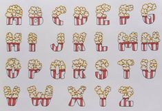 the numbers are made up of popcorns in red and white striped bags on a sheet of paper