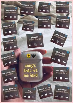 someone is holding an mp3 player in their hand with the words song's that hit me hard