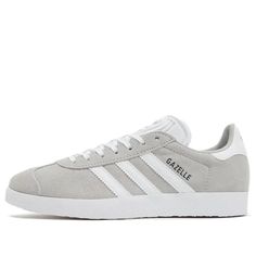 (WMNS) adidas originals Gazelle 'Grey White' IF0917 Gray Gazelle Adidas Outfit, White Suede Adidas Logo Sneakers, White Adidas Suede Skate Shoes, Gray Sneakers With Vulcanized Sole For Light Sports, White Suede Adidas Skate Shoes, Gray Low-top Sneakers With Gum Sole, Adidas Gray Sneakers With Gum Sole, Gray Suede Sneakers With Boost Midsole, Gray Adidas Lace-up Sneakers