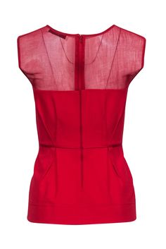 Add a pop of color to your wardrobe with this ravishing red sleeveless peplum top by Stella McCartney. The delicate mesh upper adds a touch of edge to the classic peplum style. Perfect for any occasion, this top is sure to turn heads! Size 6 (IT 42) Made in Italy 69% Viscose, 21% Polyamide, 5% Elastane, 5% Cotton Unlined Exposed back zipper Mesh upper Peplum fit Bust 32" Waist 26" Shoulder to hem 24" Summer Party Tops With Back Zipper, Summer Tops With Back Zipper For Night Out, Summer Night Out Tops With Back Zipper, Summer Evening Top With Sheer Bodice, Chic Summer Tops With Back Zipper, Elegant Summer Tops With Sheer Bodice, Elegant Sheer Bodice Top For Summer, Sleeveless Sheer Bodice Top For Party, Summer Evening Fitted Peplum Top