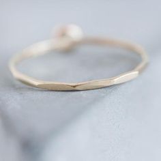 Tiny skinny stackable ring with beautiful Pink Opal. It is made with a skinny but sturdy band, perfect for everyday wear. It is a gentle and delicate piece, which you may wear alone or stacked. It is a great every-day jewel which will perfectly suit any occasion and any outfit. The ring is 0,8-0,9 mm thick and looks very dainty on the finger. Choose the size of the stone (3 or 5 mm) and material for the ring (sterling silver or 9k gold). If you want to change the ring band design or get a custom Minimalist Hammered 14k Gold Stackable Rings, 14k Gold Faceted Birthstone Ring, Minimalist Hammered Stackable Rings In Recycled Gold, Everyday 14k Gold Faceted Jewelry, 14k Gold Faceted Promise Ring, Dainty Faceted Round Rings, Minimalist Hammered Stackable Rings, Minimalist Round Faceted Jewelry, 14k Gold Hammered Stackable Promise Rings