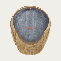 Designed in Europe, our Hatteras is defined by its impeccable stitching and sense of bold simplicity. Soft corduroy transitions from season to season. The 8-piece construction and sewn-down brim are traditional features inspired by the iconic Newsboy Cap, which in turn took its cues from the Scottish Bonnet-style hats and Irish Flat Caps worn by farmers and laborers of the 14th-century. When those same workers eventually immigrated to the U.S.A. they brought their hats with them, which quickly c Flat Bill Corduroy Hats For Winter, Corduroy Flat Bill Hat For Winter, Scotch Bonnet, Flat Caps, Men’s Boots, Wide Trousers, Thigh Boot, Newsboy Cap, Flat Cap