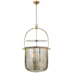 a light fixture hanging from the ceiling with a glass dome on it's side