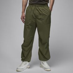 Lightweight and ready for whatever, these woven nylon pants have a water-repellent finish to help you stay dry when rain rolls in. Plus, elastic drawcords at the hem give you styling power. How will you wear 'em? Athleisure Parachute Pants With Drawstring For Outdoor, Outdoor Athleisure Parachute Pants With Drawstring, Nylon Parachute Pants With Functional Drawstring For Outdoor, Sporty Parachute Pants With Functional Drawstring For Outdoor, Relaxed Fit Outdoor Pants With Functional Drawstring, Sporty Parachute Pants With Relaxed Fit For Outdoor, Nylon Parachute Pants With Drawstring For Hiking, Outdoor Parachute Pants With Functional Drawstring, Utility Style Waterproof Bottoms For Streetwear