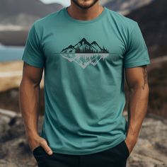 -----Our Product----- Embrace the beauty of the great outdoors with our exclusive nature-themed t-shirts, perfect for adventurers and nature lovers alike.  Each design is inspired by the beauty of nature, weekend trips to the mountains, and awe inspiring landscapes.  Whether you're hiking, camping, or simply enjoying a day in the sun, our outdoor apparel is designed to keep you comfortable and connected to nature.  Explore our collection of wildlife themed t-shirts, mountain landscape shirts, an Green Graphic Tee For Outdoor, Green Short Sleeve T-shirt For Outdoor, Green T-shirt For Outdoor Activities, Green Graphic Tee For Outdoor Activities, Green Crew Neck T-shirt For Outdoor, Outdoor Green T-shirt With Graphic Print, Green Graphic Tee For Camping, Green Graphic Print Outdoor T-shirt, Green Graphic Tee For Hiking