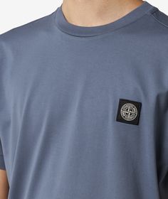 Born from the innovative spirit of Italy, Stone Island has consistently pushed the boundaries of modern fashion since its founding in 1982. Known for its commitment to research and innovation, the brand seamlessly combines functionality with a distinctive style that stands out in the crowd.Get ready to elevate your wardrobe with the Stone Island Logo T-Shirt in stunning azul, a staple piece for the Fall/Winter 2024 season. This short sleeve t-shirt falls under the essentials category, reflecting Material Experimentation, Stone Island T Shirt, Stone Island Logo, Italian Blue, Island Logo, Fall Winter 2024, Bank Card, Stone Island, Winter 2024