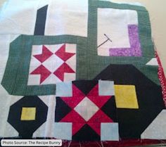 a close up of a quilt on a table