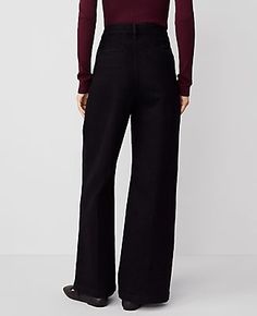 A modern jean with a perfect drape and high waist that endlessly flatters. Front zip with double hook-and-bar closure. Belt loops. Front double pleats. Front off-seam pockets. Back besom pockets.,Leg Shape:Trouser – a pant with a bit of flare that lengthens legs,Rise:High rise: sits 1/2" to 1" below natural waist,Imported:Imported,Fit:Relaxed & easy,Length:Full length: 31" inseam with 25" leg opening,Fabrication:98% Cotton, 2% Elastane,Garment Care:Machine Washable The Pleated Trouser by Ann Tay High-rise Bottoms For Business Casual Fall Season, High Rise Bottoms For Business Casual In Fall, High Waist Jeans For Business Casual Fall, High Waist Jeans For Work With Zip Fly, Workwear Jeans With Belt Loops For Fall, High Waist Jeans With Zip Fly For Work, Chic Wide Leg Jeans With Zipper Closure, Modern Workwear Bottoms With Zipper Closure, Business Casual Bottoms With Zip Fly For Fall