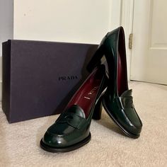 **Never Worn** Ladies Vintage Prada Calzature Donna Spazzoltao Fume Heel Loafers In Abete (Dark Green) Size 39.5. Brand New In Box. Stacked Heel 3.5" Inches. Formal Green Heels With Leather Lining, Luxury Green Loafers For Office, Luxury Green Loafers For Work, Elegant Green Loafers For Business, Green Loafers For Formal Fall Occasions, Elegant Green Loafers For Formal Occasions, Green Formal Loafers For Fall, Elegant Green Formal Loafers, Luxury Green Loafers