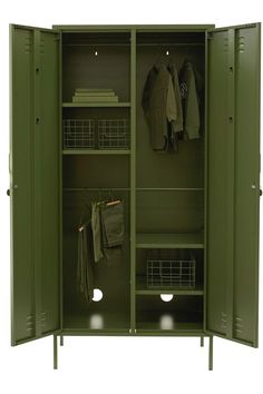 a green metal locker with clothes hanging on it