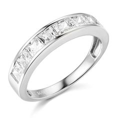 a white gold ring with princess cut diamonds