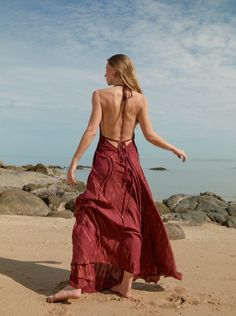 Embrace dreamy vacation vibes any time of the year with this tie-dye halter neck maxi dress in burgundy. Designed for long, carefree days under the sun, the Luna Maxi Dress strikes the balance between stylish and comfortable. Featuring a jaw-dropping deep V-neck and a head-turning open back, this maxi dress gives you a slender, elongated silhouette that you’ll love. The almost fluidic softness of the fabric and the delicate flow of the full-length hemline give you an effortlessly graceful look.W Dreamy Vacation, Halter Neck Maxi Dress, Long Kaftan, Handkerchief Dress, Goddess Dress, Vacation Vibes, Tie Dye Maxi Dresses, Halter Maxi Dress, Halter Maxi