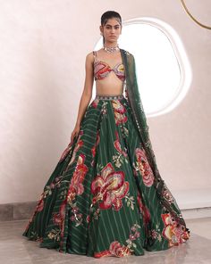 Embroidered Lehenga With Matching Blouse And DupattaFrom Mahima Mahajan's Fida collection. DELIVERY TIMEPlease allow 6-8 weeks for your outfit to arrive. FABRIC DETAILSOrganza, Shantoon Professional cleaning only. Modern Lehenga, Ruffled Saree, Lehenga Style Saree, Indian Bridesmaid Dresses, Floral Lehenga, Green Lehenga, Lehenga Style, Embroidered Lehenga, Indian Wedding Wear