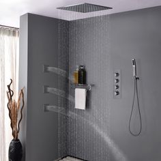 the shower head is attached to the wall