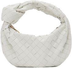 Intrecciato-woven nappa lambskin top handle bag in white. · Fixed carry handle featuring knotted detailing at top · Zip closure · Tonal buffed leather lining · Gold-tone hardware · H6 x W10 x D4 in Supplier color: White/Gold White Bottega Bag, White Bottega Veneta Bag, Bogetta Veneta, White Designer Bag, White Bag Outfit, Bottega Veneta Jodie Mini, Mini Jodie Bag, Jodie Bag, Bottega Bag