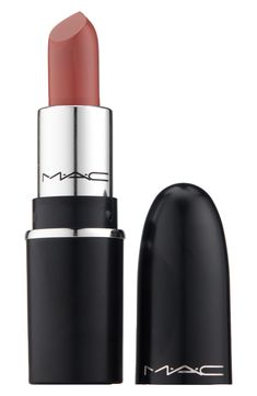 What it is: A mini lipstick with a silky matte formula that delivers 12 hours of full-coverage color and eight hours of moisture.What it does: M·A·C's iconic lipstick has been maxed out to give lips more with a silky matte finish and good-for-lips formula that looks richer, feels better and lasts longer. The formula offers full-coverage, pigment-rich payoff in a wide range of artist-approved shades. The creamy blend of coconut oil, organic shea butter and organic cocoa butter conditions and nour Mac Make Up, Dream Vanity, Mac Lipstick Shades, Mauve Lipstick, Mini Lipstick, Wishlist 2024, Velvet Teddy, How To Look Rich, How To Apply Lipstick