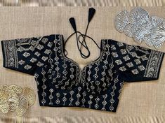 Buy black heavy embroidery choli cut blouse online in USA. Elevate your saree style with exquisite readymade saree blouses, embroidered saree blouses, Banarasi sari blouse, designer saree blouse, choli-cut blouses, corset blouses from Pure Elegance Indian fashion store in USA.-front Choli Cut Blouse, Banarasi Sari, Designer Saree Blouse, Cut Blouse, Blouse Designer, Corset Blouse, Saree Style, Readymade Saree, Embroidered Saree