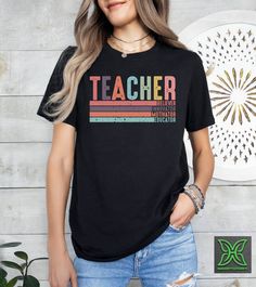 Retro Teacher Shirt, Believer Motivator Innovator Educator,Teacher Appreciation Gift,Back To School Tee,Last Day of School,New Teacher Shirt HOW TO ORDER 1. From the two Drop-down menus select the Size and the Shirt Color you need. 2. Add these to your cart. *You will need to return to the listing to add the other sizes and designs you need before checking out. 3. After adding all the shirts to the Cart, Checkout them together. DELIVERY & RETURN Order Processing time for Dispatch: 1 working days Relaxed Fit Tops With Text Print For Teaching, Graphic Tee With Text Print For Teaching, Black Top With Text Print For Teaching, Black Text Print Top For Teaching, School Tees, New Teacher, Teacher Appreciation Gift, New Teachers, Last Day Of School