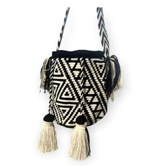 You will never go wrong with Black and Off-white!!! Unique and Stylish crochet bag! Very lightweight, durable and comfortable to carry on. Wear it as a crossbody or shoulder bag. These stunning boho style bags are perfect for a casual day, as a beach/pool accessory or as a complement to your sports outfit. Details: Bucket bag style Special Edition design with colorful and traditional patterns Double-thread & one needle crocheted Matching handmade single-thread strap Drawstring closure with Speci Perissa Beach, Bucket Bag Style, Boho Style Bag, Bohemian Purse, Greek Pattern, Crochet Boho Bag, White Bohemian, Black Chevron, Boho Bags