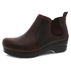 PRICES MAY VARY. CLASSIC STYLE: High quality leather uppers and a strong PU outsole work to make this timeless bootie extremely durable so it will last you from season to season. ALL DAY COMFORT: A padded instep collar, Single-Density open cell PU sockliner, added arch support, a roomy, reinforced toe box, and a protective heel counter for stability all support you endlessly in the most comfortable boot you've ever owned. KEEP MOVING FORWARD: The Anti-Fatigue rocker bottom we are known for in ou Dansko Boots, Shoes Stand, Wide Heels, Chelsea Boots Women, King Louie, Pu Heels, Comfortable Boots, Dansko Shoes, Chelsea Boot