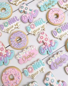 decorated cookies are arranged on a table with the words'donuts, crumbs and glaze '