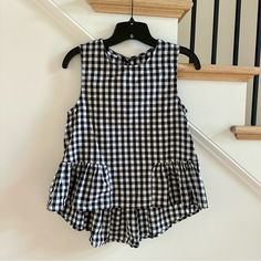 New Without Tags. Sleeveless Black And White Gingham Print Ruffle Hem Peplum Top. S:Bust:35.8in,Length:23.2in,Shoulder:13.8in Sleeveless Plaid Tops For Picnic, Sleeveless Plaid Blouse For Summer, Plaid Sleeveless Tops For Picnic, Plaid Sleeveless Tops, Sleeveless Gingham Cotton Top, Sleeveless Gingham Tops For Summer, Spring Sleeveless Tank Top For Picnic, Cotton Sleeveless Tank Top For Picnic, Sleeveless Gingham Tank Top For Spring