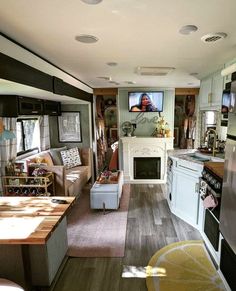 the kitchen and living room are separated by an open floor plan