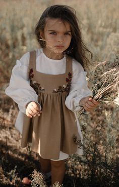 The set includes a linen cottagecore dress and an apron dress for girls. Lightweight A-line dress with puff sleeves. The apron is decorated with hand flower embroidery.             It`s a perfect dress for any occasion as a birthday party or wedding flower girl. If you have any questions or need more measurement please contact us. We will gladly help you. Cottagecore Prairie Dress For Garden Party, Cottagecore Beige Dress With Floral Embroidery, Cotton Cottagecore Pinafore Dress, Cottagecore Cream Dress For Fall, Cream Cottagecore Dress For Fall, Beige Cottagecore Prairie Dress For Garden Party, Cream Cottagecore Fall Dress, Pinafore Dress Toddler, Boho Dress Outfit