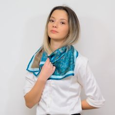 A pure silk scarf in a square cut, with a unique design that is handmade, in different colors so you can choose the one that fits you. SIZE 70 centimetres by 70 centimetres WEIGHT 26gr FABRIC Each scarf is made with pure silk crepe satin, with 12mm thickness COLOR Colours may appear different in the photo because of camera angles or shadows. Primary colour: Blue HOW TO CARE FOR YOUR SCARF Submerge in lukewarm water with liquid soap  Leave to dry in shadowy place Iron damp with a hot iron Any que Chic Rectangular Silk Scarf As A Gift, Chic Rectangular Silk Scarf For Gifts, Elegant Silk Square Scarves, Blue Elegant Rectangular Silk Scarf, Elegant Blue Rectangular Silk Scarf, Trendy Square Silk Scarf As A Gift, Trendy Square Silk Scarf As Gift, Trendy Square Silk Scarf Gift, Elegant Square Silk Scarf