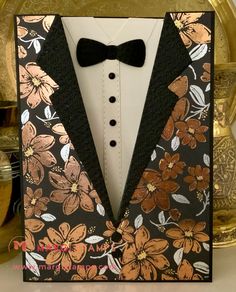 a card with a tuxedo and bow tie on it