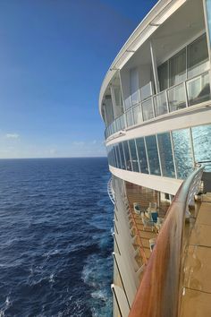 the top deck of a cruise ship looking out at the ocean on a sunny day