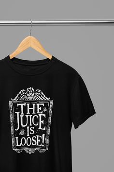 Experience the unforgettable charm and wit of the iconic Beetlejuice in our Beetlejuice Beetlejuice 2024 The Juice is Loose Quote Movie T-Shirt/Sweatshirt! Perfect for any fan, this shirt/sweatshirt showcases the timeless quote and captures the essence of the film. Get yours now and add a touch of magic to your wardrobe! Welcome to Poster Kingz, your ultimate destination for T-shirt enthusiasts and pop culture aficionados! We take immense pride in curating a captivating collection of T-shirts inspired by your favorite films, beloved TV shows, and iconic music artists. Size Guide: T-Shirts Sizes: S 34/36" M 38/40" L 42/44" XL 46/48" 2XL 50/52" Sweatshirt Sizes S 34/36" M 38/40" L 42/44" XL 46/48" 2XL 50/52" 3XL* 54/56" 4XL* 58/60" 5XL* 62/64" Quality and Comfort:Our T-shirts are crafted wit Beetlejuice Tshirt, Beetlejuice 2024, Quote Movie, Classic Movie Quotes, Beetlejuice Beetlejuice, Xmas Tees, Music Tees, Halloween Tees, Movie T Shirts