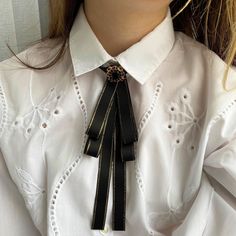 Thin black bow tie for women. Cowboy handmade ties. Gift for her. Color :  black. Length: 8.5 Inches Width: 3.0 Inches DISCLAIMER: Some items may contain small parts that may pose a choking hazard for small children should they come loose. Please supervise children at all times while wearing any item purchased from NataliBrooches. The buyer assumes all responsibility at the time of purchase. If you have any questions, do not hesitate to contact me and I will get back to you right away. If you have special requests, leave it in your comment.  Do you want to look through more bow ties in such design? You could find them here:  https://www.etsy.com/shop/NataliBrooches?ref=seller-platform-mcnav&section_id=23852811 Follow us on Instagram for sneak peaks and exclusives on new releases  https://w Female Bow Tie, Suits For Women With Tie, Queer Black Tie Fashion, Women’s Tie, Bowtie Outfits For Women, Women Tie Outfit, Bow Tie Outfits For Women, Tie On Women, Bow Tie Aesthetic