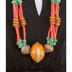 Stunning vintage Moroccan hand crafted, vibrantly colored Berber tribal faux amber resin wedding necklace.   Striking Amazigh (Berber) wedding necklace comprising faux coral, amazonite, with old animal-horn and faux amber from the Atlas Mountains, along with traditional Tuareg and Berber beads, red faux coral, turquoise, hand rolled ceramic beads, engraved Berber silver., resin beads, small silver beads, horn and additional beads in rich turquoise blue, and yellow amber is characteristic of Berb Handmade Amber Jewelry For Festivals, Bohemian Jewelry With Large Beads For Traditional Ceremonies, Red Bohemian Necklaces For Traditional Ceremonies, Bohemian Red Necklaces For Traditional Ceremonies, Unique Ceremonial Jewelry With Round Beads, Handmade Unique Jewelry For Traditional Ceremonies, Bohemian Large Beads Necklaces For Traditional Ceremonies, Bohemian Jewelry With Polished Beads For Traditional Ceremonies, Bohemian Large Beads Necklace For Traditional Ceremonies