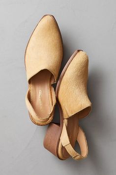 Luxury Calf Leather Dress Shoes With Flat Heel, Luxury Leather Slip-ons For Fall, Luxury Slip-on Mules With Wooden Heel, Luxury Slip-ons For Fall, Luxury Leather Slip-ons For Spring, Luxury Brown Leather Shoes For Spring, Chic Luxury Leather Shoes With Branded Insole, Luxury Chic Leather Slip-ons, Elegant Brown Mules