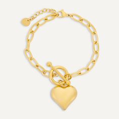 Steal all the attention at your next event with this trendy heart charm T-bar bracelet. This beautiful piece would make a great fashion accessory to any event - work or play.Featuring a modern T-bar clasp for ease of wear. Gold-Tone Plated | Nickel, Lead, and Cadmium Free Product Code: DB2149K Collection: Sweetheart Type: Clasp Material: Stainless Steel Dimensions: Length 18-21cm Pendant Dimensions: Style: Heart & Chain-Link Includes: Valentine's Day Gold Plated Bracelet With Heart Charm, Valentine's Day Gold Chain Charm Bracelet, Valentine's Day Gold Plated Heart Charm Bracelet, Luxury Gold Heart-shaped Charm Bracelet, Gold-tone Metal Link Charm Bracelet, Heart Chain, Bar Bracelets, Perfume Spray, Keep Jewelry