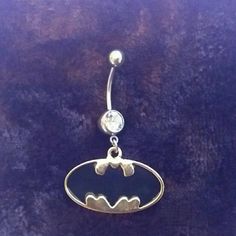 Batman Belly Ring. The Top Is Silver With A Rhinestone And The Batman Emblem Is Gold. New. Buy 2 Get One Free. The Lesser Value Will Be Free. Will Make A New Listing For Multiples Silver Stainless Steel Body Jewelry, Nickel-free Silver Metal Belly Rings, Nickel-free Silver Stainless Steel Body Jewelry, Nickel-free Stainless Steel Silver Body Jewelry, Silver Stainless Steel Bling Jewelry, Silver Sterling Silver Belly Rings, Batman Emblem, Batman Ring, Bellybutton Ring