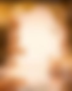 blurry image of an orange and yellow background