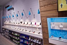 a store with many items on display in it's walls and displays for cell phones