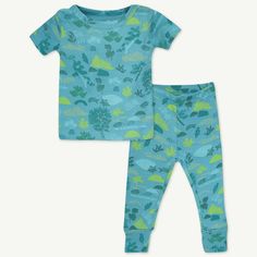 Bed time is super fun with our 100% organic cotton sleepwear. This soft cotton fabric is comfortable and stylish in our cute bird & lily print. Our 2 piece PJs are easy to put on and take off and the snug fit design keeps your child cozy all night. Playful Printed Cotton Sleepwear, Green Cotton Sleepwear For Bedtime, Spring Organic Cotton Sleepwear, Matching Cotton Sleepwear For Bedtime, Matching Cotton Sleepwear, Comfortable Green Cotton Sets, Matching Cotton Tops For Sleepover, Green Matching Sleepwear For Loungewear, Green Matching Lounge Sleepwear