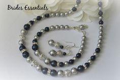 This listing is for necklace, bracelet and earrings set, made with all Swarovski pearls mix with some silver plated rhinestone ball. The first picture shows the Light Silver Grey (Main Pearl color) with Navy Blue (Accent pearl color). Necklace is 16" long with 2" extension for adjustment with a pearl dangle at the end The bracelet measures 7 inches long adjustable to about 8 inches long with a pearl dangle at the end . If you need a longer or shorter length, please drop a note at check out under Bridesmaid Necklace Gift, Necklace Ideas, Set Necklace, Bridesmaid Necklace, Blue Pearl, Swarovski Pearls, Wedding Jewelry Sets, Pearl Color, Necklace Gift