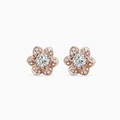 rose shaped diamond stud earrings in 18k rose gold with white topazs and diamonds