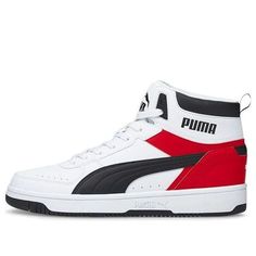 a white and red high top sneaker with the word puma written on it