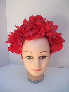 * A versatile headpiece this vibrant red rose fascinator can be worn all year round from now to Halloween to Christmas to Valentine's Day and any events in between! * The roses are nestled together to form the traditional halo affect and the pieces is well balanced, secure and comfortable to wear. * It has been designed on an acrylic headband covered in grosgrain ribbon. * Great for a Bridesmaid's headpiece, this can be made in any color desired. Wear it for Halloween, Ladies Luncheon, Benefit D Red Headpieces With Handmade Flowers, Adjustable, Red Adjustable Headpiece With Handmade Flowers, Adjustable Red Headpiece With Handmade Flowers, Red Flower Headband With Handmade Flowers, Red Flower Fascinator For Party, Adjustable Red Fascinator With Handmade Flowers, Red Fascinator With Matching Headband For Party, Red Handmade Flowers Headband For Party, Red Headband With Handmade Flowers For Party