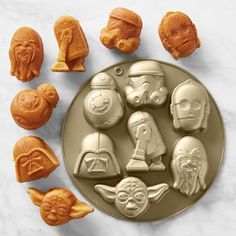 star wars cookie molds on a plate